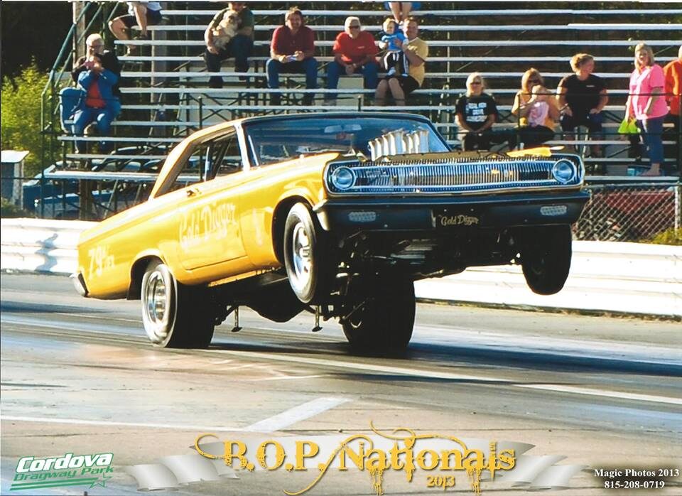 Gold Digger Dodge in a big wheelstand